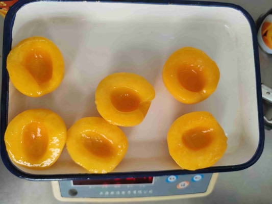 甘い天然 缶詰 黄色 桃 果物 美味しい 室温 で 保存 する