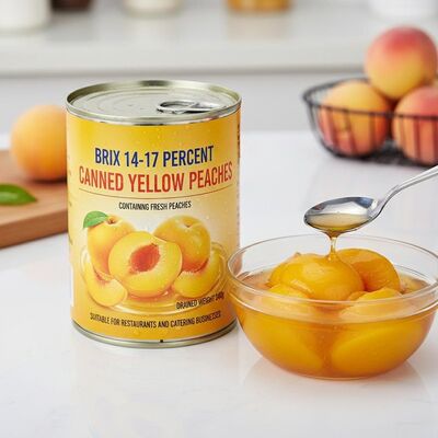 Brix 14~17% 缶詰の黄桃 新鮮な桃を含む 排水重量 240g レストランや飲食事業に適しています